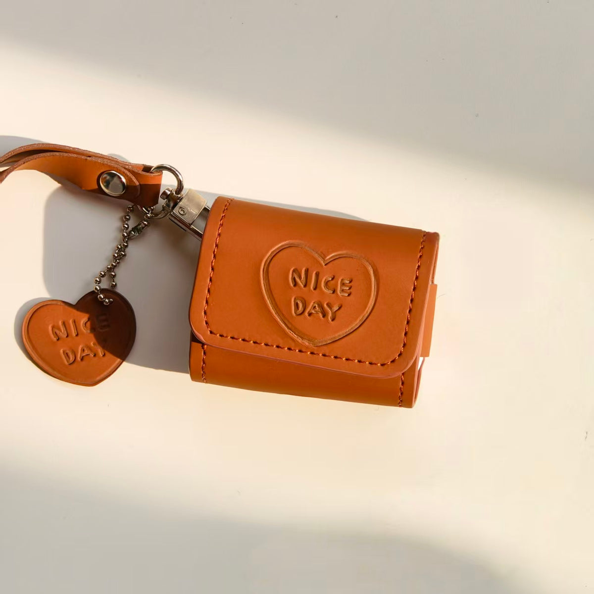 Vintage "NICE DAY" Heart Embossed Leather AirPods Case with Wristlet & Charm | Retro Brown Cover | Compatible with AirPods 1/2/3/Pro | 2026 Trending Aesthetic