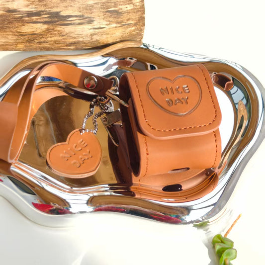 Vintage "NICE DAY" Heart Embossed Leather AirPods Case with Wristlet & Charm | Retro Brown Cover | Compatible with AirPods 1/2/3/Pro | 2026 Trending Aesthetic