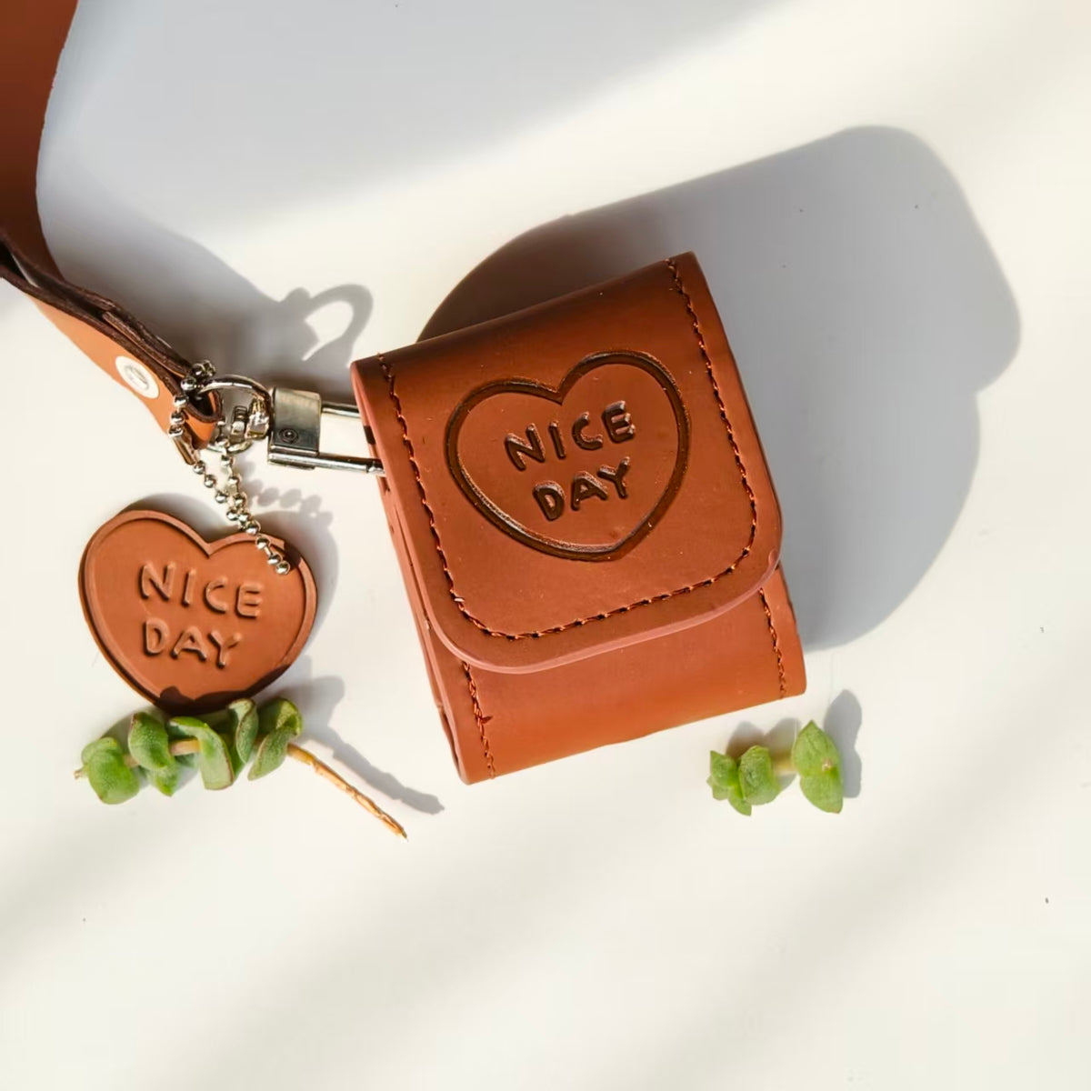 Vintage "NICE DAY" Heart Embossed Leather AirPods Case with Wristlet & Charm | Retro Brown Cover | Compatible with AirPods 1/2/3/Pro | 2026 Trending Aesthetic