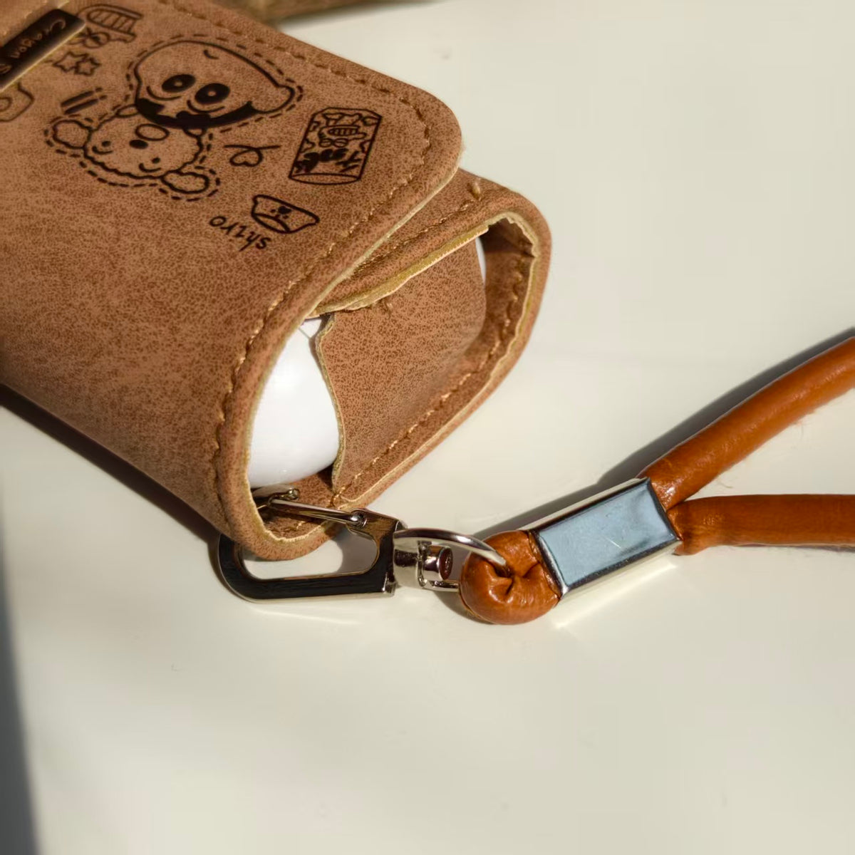 Vintage Crayon Shin-chan Leather AirPods Case with Wristlet Strap | Cute Cartoon Embossed Cover | Compatible with AirPods 1/2/3/Pro | 2026 Trending Retro Aesthetic