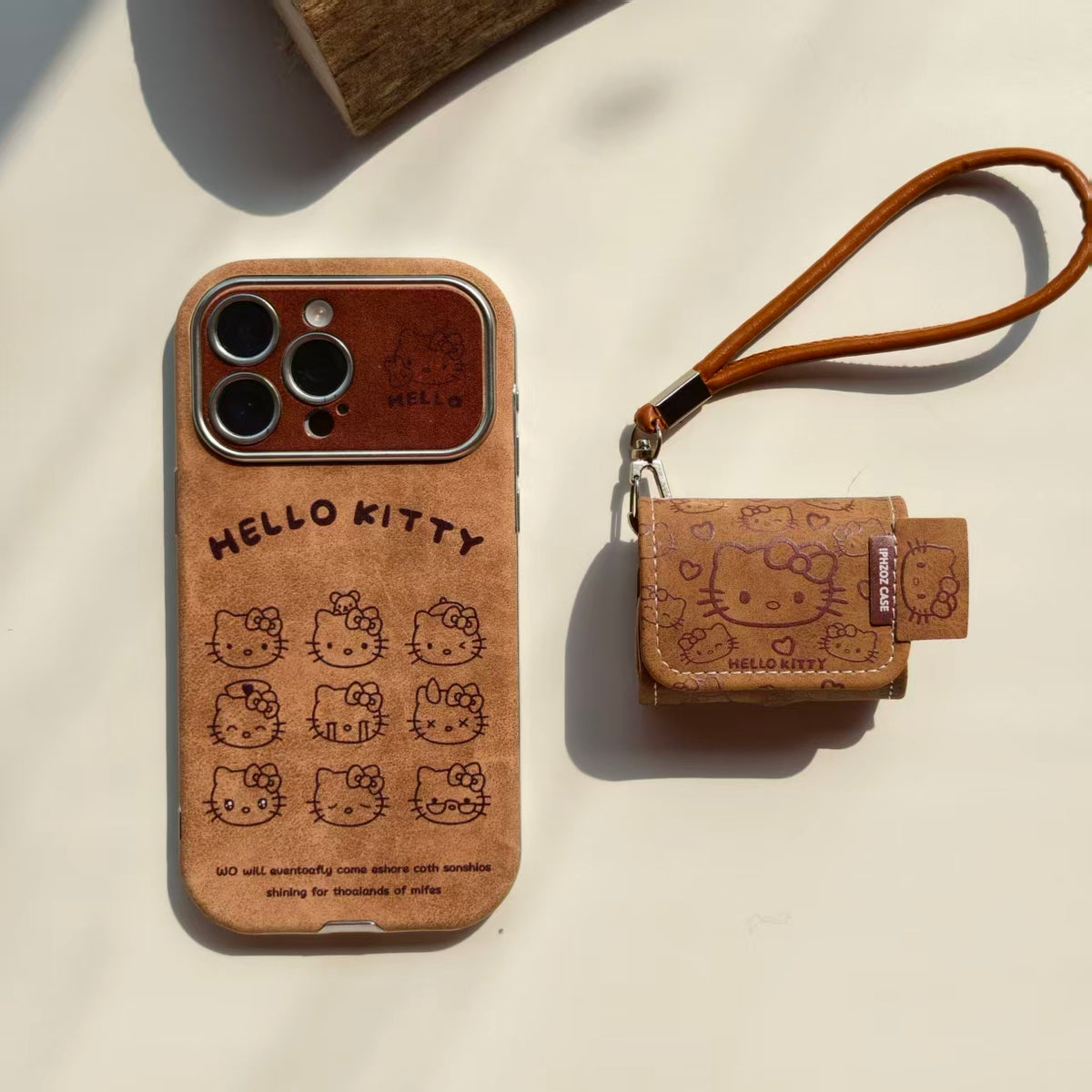 Vintage Hello Kitty Leather iPhone Case & AirPods Case Set | 2026 Trending Retro Kawaii Phone Cover for iPhone 12-17 Pro Max | AirPods 1/2/3/Pro | Brown Leather Wristlet Strap