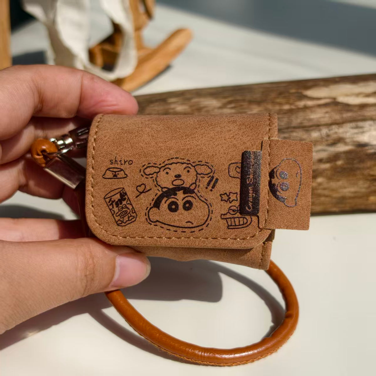 Vintage Crayon Shin-chan Leather AirPods Case with Wristlet Strap | Cute Cartoon Embossed Cover | Compatible with AirPods 1/2/3/Pro | 2026 Trending Retro Aesthetic