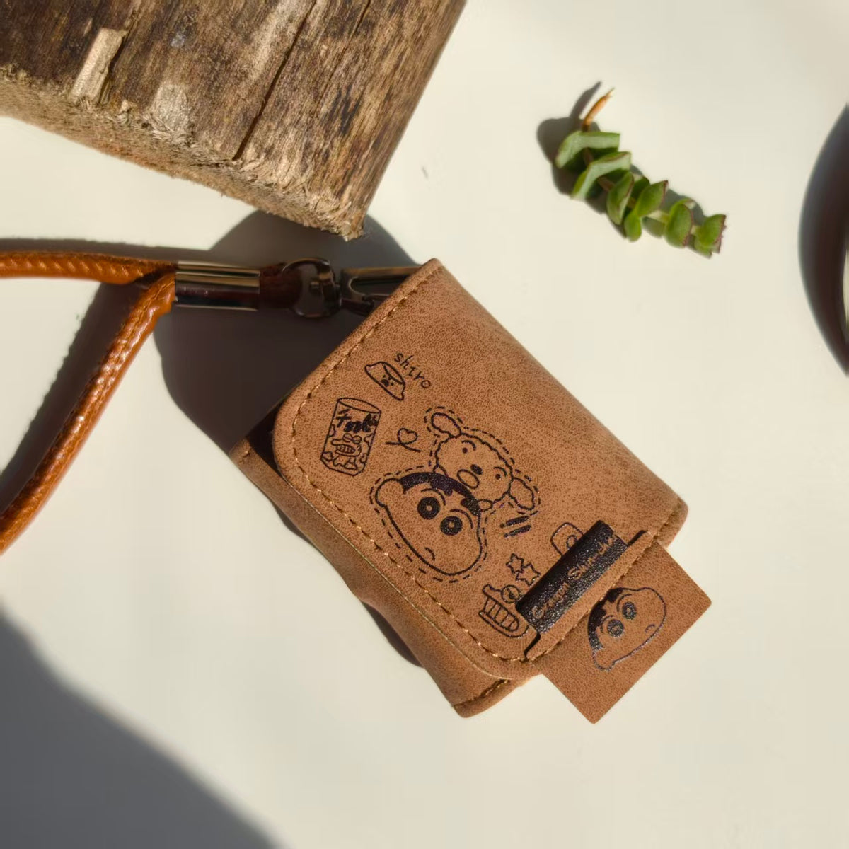 Vintage Crayon Shin-chan Leather AirPods Case with Wristlet Strap | Cute Cartoon Embossed Cover | Compatible with AirPods 1/2/3/Pro | 2026 Trending Retro Aesthetic