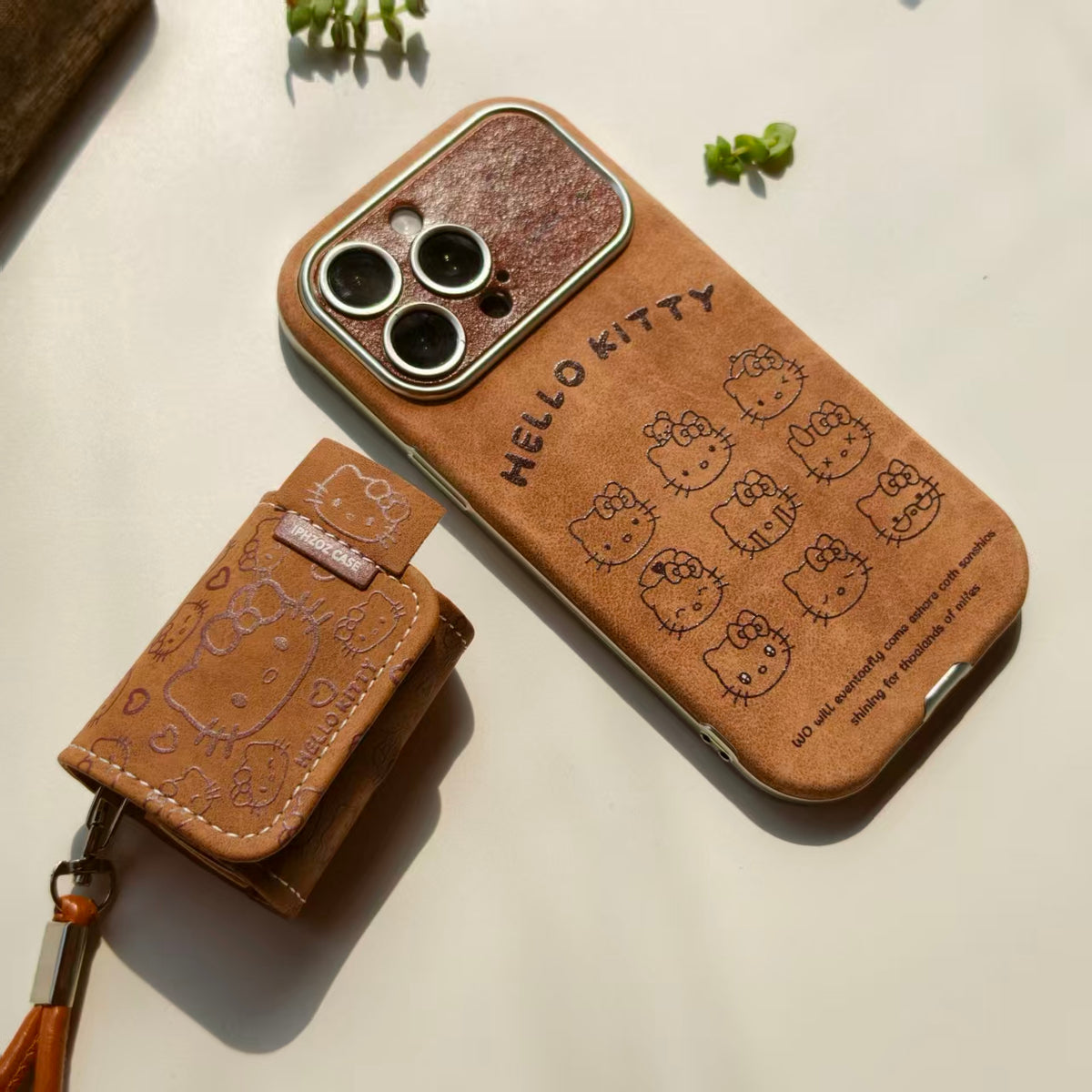 Vintage Hello Kitty Leather iPhone Case & AirPods Case Set | 2026 Trending Retro Kawaii Phone Cover for iPhone 12-17 Pro Max | AirPods 1/2/3/Pro | Brown Leather Wristlet Strap