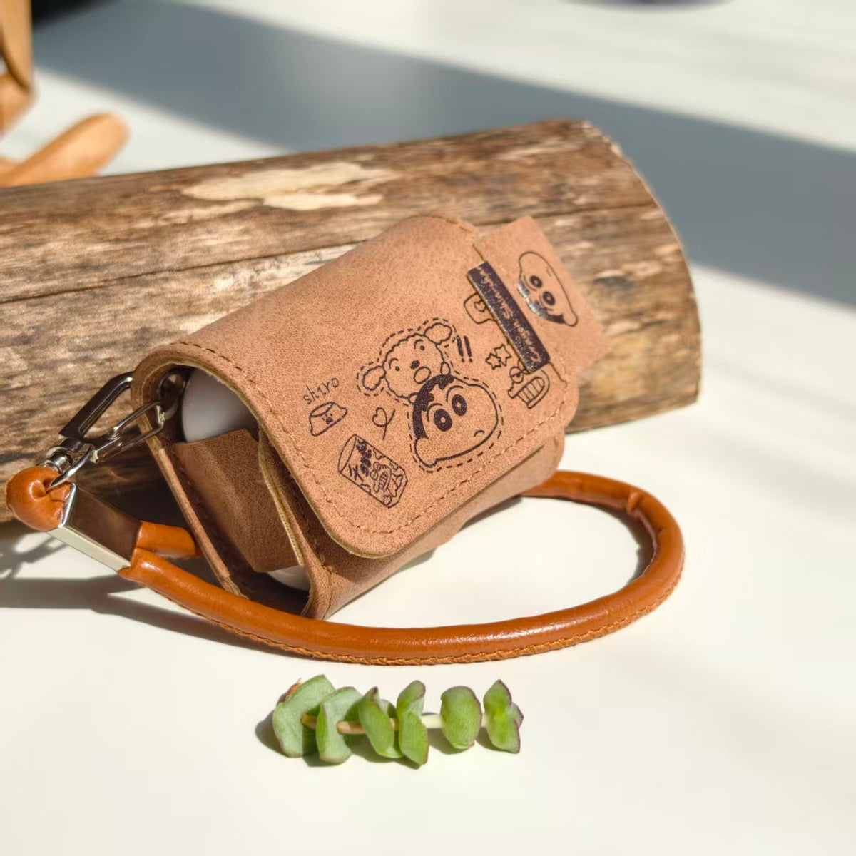 Vintage Crayon Shin-chan Leather AirPods Case with Wristlet Strap | Cute Cartoon Embossed Cover | Compatible with AirPods 1/2/3/Pro | 2026 Trending Retro Aesthetic